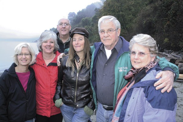 Those active in the fight to protect Maury Island gathered Sunday next to the mine site. In the front row from left are former POI presidents Libby McLardy