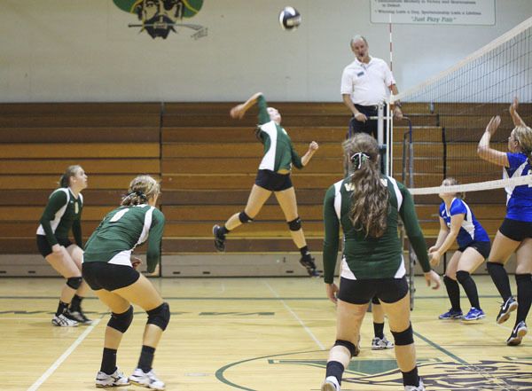 Senior Sammy Fall  goes for the kill at game point in the first game of the Pirates’ 3-0 match win over Chimacum last week.