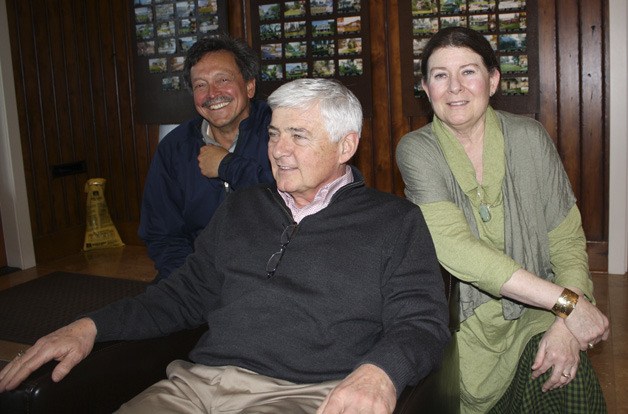 John and Beth de Groen (back row) purchased the Windermere office from  Dick Bianchi (front) and his wife Linda.