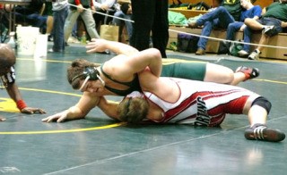 Vashon’s Geran Webb is seconds away from pinning Orting’s Cody Baskett to win third place in the 215-pound weight class at The Rock  Wrestling Tournament Dec. 30.