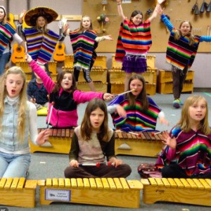 These young students in Ms. Hirman’s music class at Chautauqua will receive nine keyboards