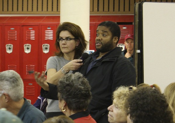 Islander Trent Sheppard addresses Washington State Ferries director David Moseley at a meeting at Vashon High School last week.