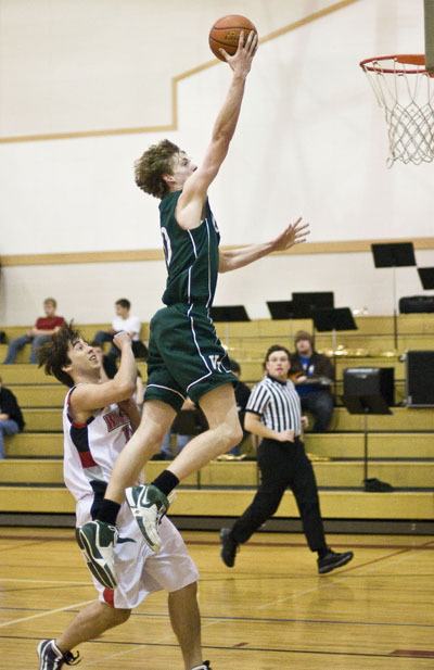 John Gage lays the ball up in front of Seattle Christian defense.