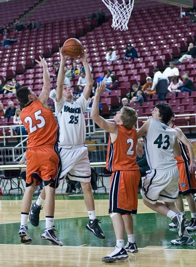 Christian Hasson shoots for two points in the Dec. 29 game against Cashmere.