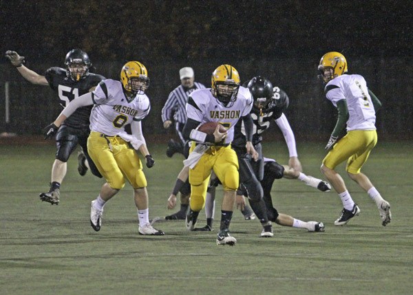 Adrian Arceo takes posession of the ball during Saturday’s tri-district playoff game.