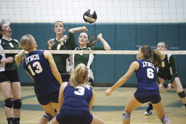 All eyes are on the volleyball as it drops for a Vashon point against Lynden Christian. Pirates