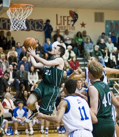 Matt Kerns lays the ball up through the Life Christian defense.