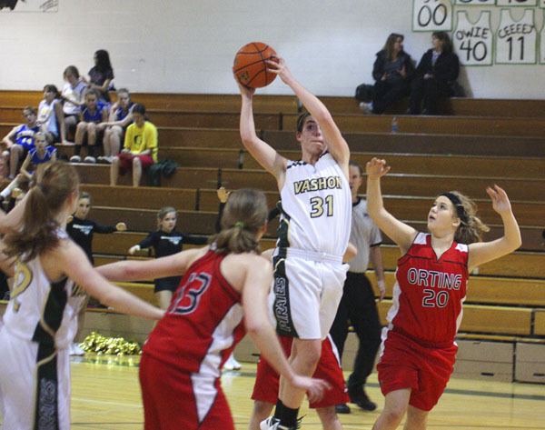 Pirate Taegan Lynch pulls down a rebound in the third quarter of Vashon's 52-28 win over Orting.