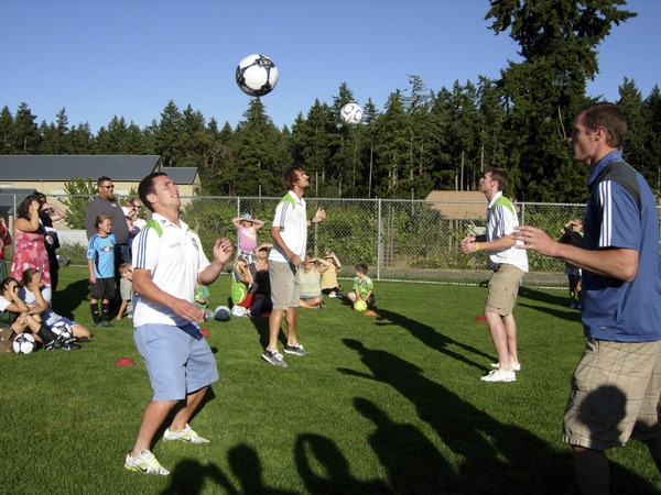 Pictured from left to right are Sounders players Michael Fucito