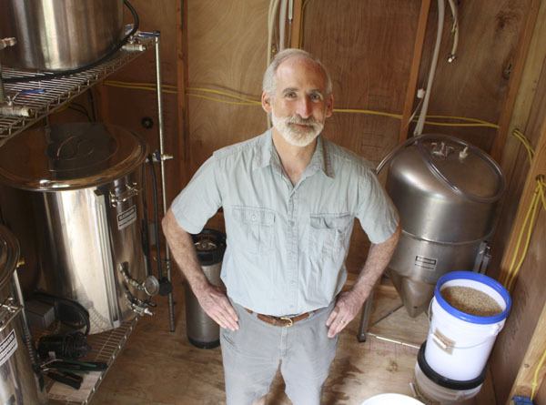 Cliff Goodman stands in his newly built brew shed