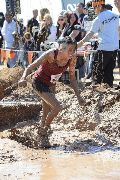 Sally Swift competes in a Tough Mudder.