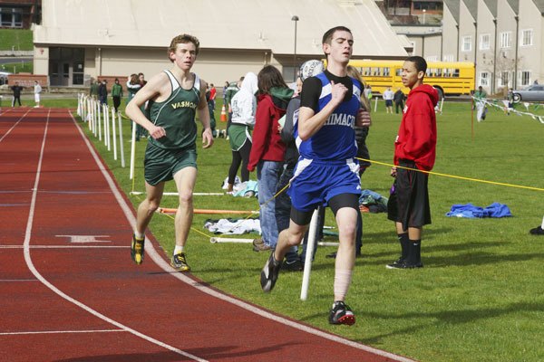 Vashon senior Aidan Cyra starts his move to pass a Chimacum runner as he passes the mid-point of the 3