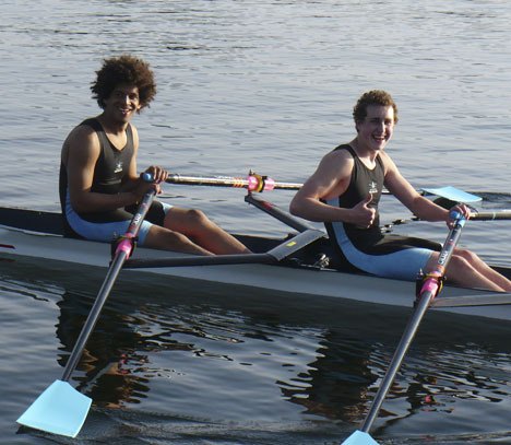 Raphael Torres and Ryan Bingham take a breather just after winning first place in their junior novice men’s double.