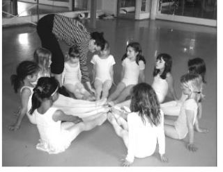 Christine Juarez works with budding ballerinas at Blue Heron Art Center.