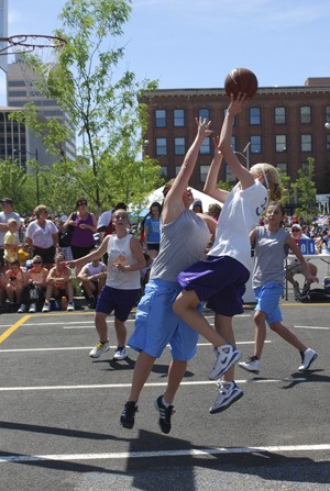 Anya Quig makes a layup.