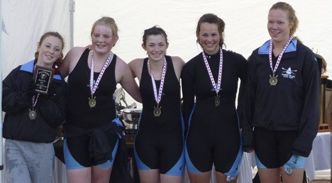 The girls’ novice four won their primary heat and took second in the finals. Pictured left to right are Hannah Scheer