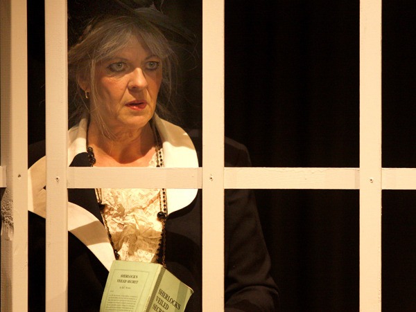 Sue DeNies comes of the shadows during a rehearsal for Drama Dock’s new show.