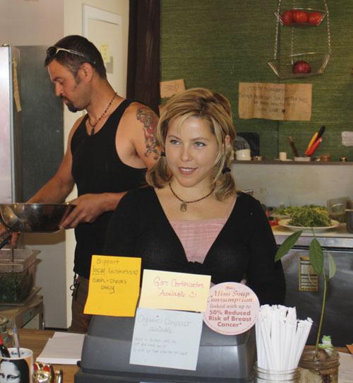 Stephanie Morris handles the lunch rush at Pure with help from Stephen Knoder.