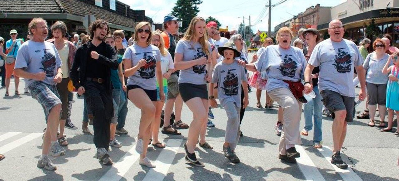 Libbie Anthony (second from right) marched in the Strawberry Festival parade in 2012 with the cast of Drama Dock’s production of “The Pirates of Penzance” — the last show of many that Anthony directed for the community theater group (Courtesy Photo).