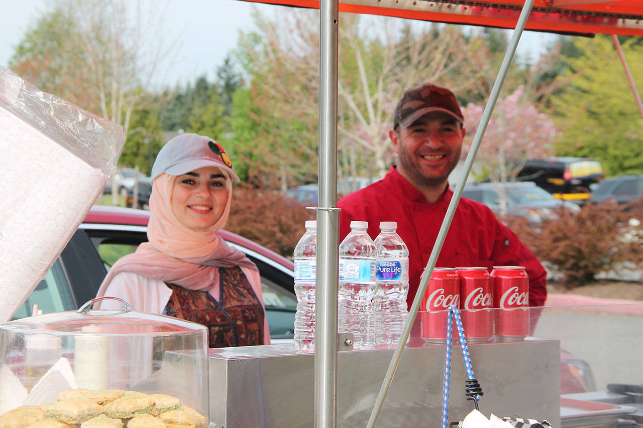 Safa Jneidi and Iyad Alati with their new food cart (Paul Rowley/Staff Photo).