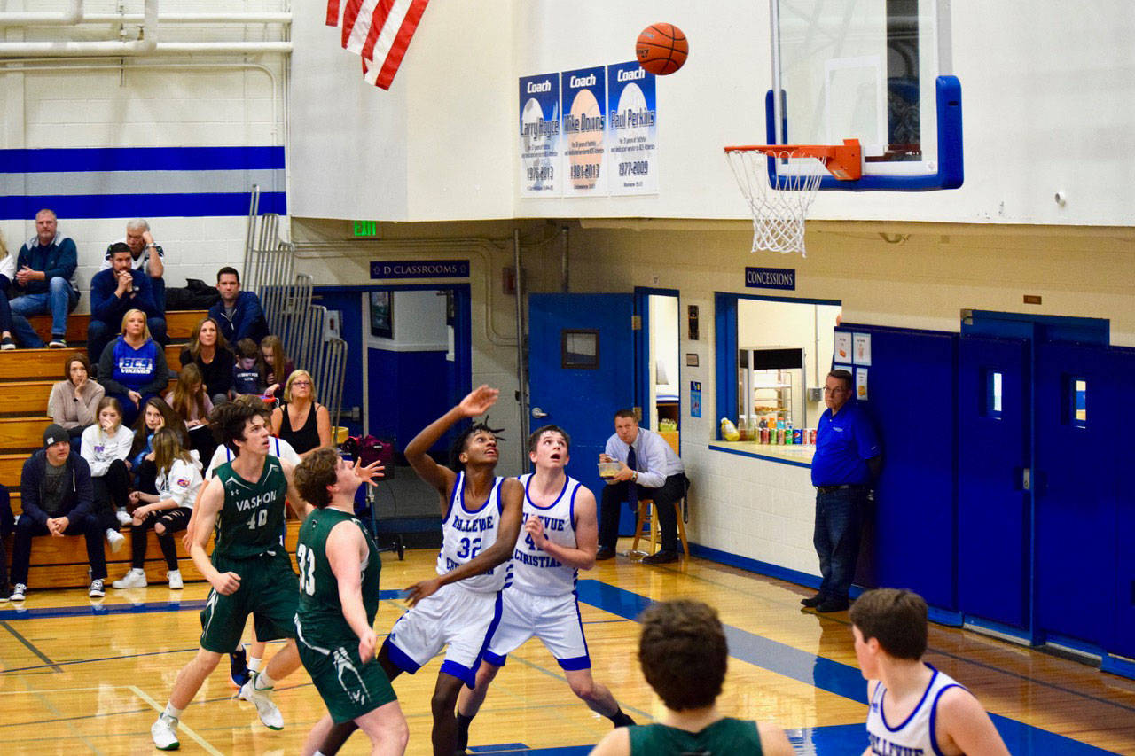 The Vashon Island High School Boys Basketball team faces off against Bellevue Christian in a recent away game. (Pam Stenerson photo)