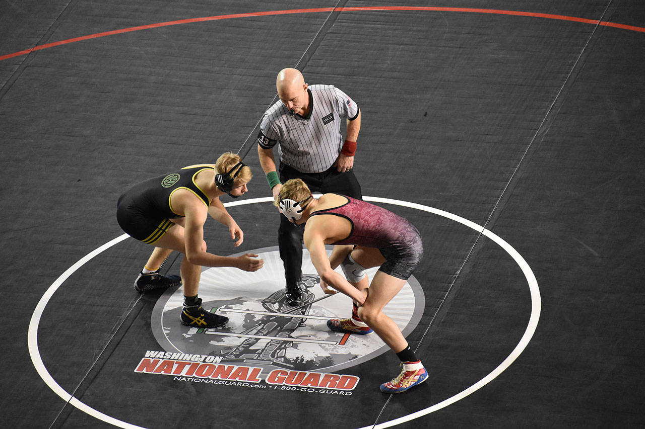 VHS Junior Jordan Rutschow, left, wrestles in the Mat Classic XXXII 1A state championship wrestling tournament on Saturday, Feb. 23, at the Tacoma Dome (Doug Langworthy Photo).                                VHS Junior Jordan Rutschow, left, wrestles in the Mat Classic XXXII wrestling tournament on Saturday, Feb. 23 at the Tacoma Dome. (Doug Langworthy Photo)