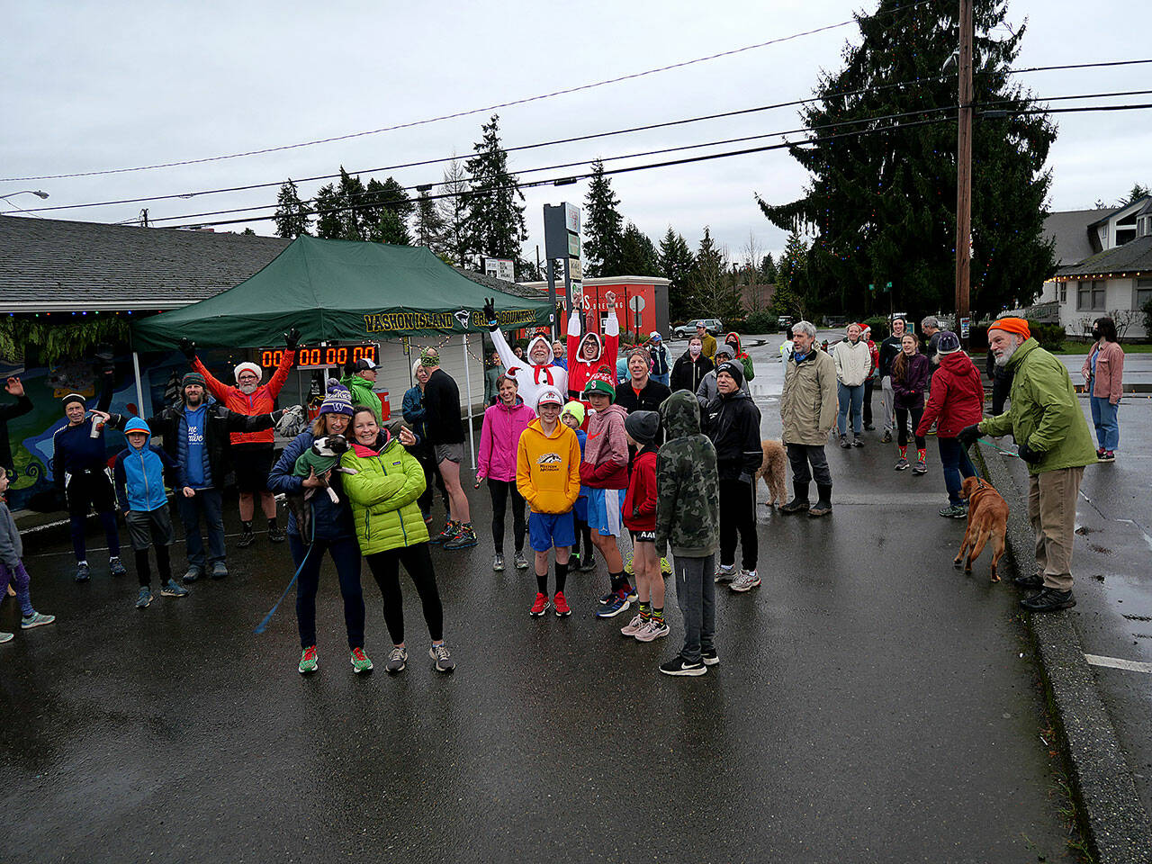 (Bruce Cyra Photo) Runners were rarin’ to go on Vashon’s annual Jingle Bell fun run.