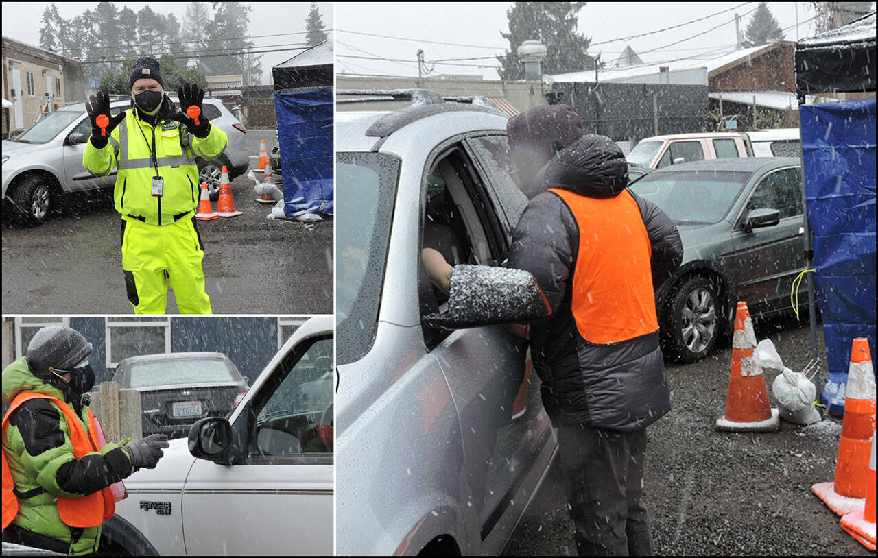 (Allen de Steiguer Photos) Many of the vaccinations provided by the Vashon Pharmacy/VashonBePrepared program happened at this drive-through vaccination site. Dozens of volunteers worked in snow, hail, rain, wind, and even on beautiful clear and sunny days. This photograph was taken one year ago and published in the Feb. 15, 2021 issue of The Beachcomber.