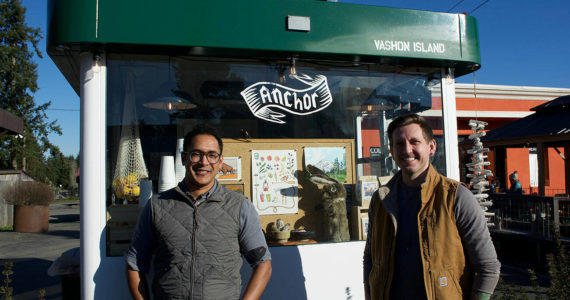 (Jenna Dennison Photo) Elijah Berry (left) and Steven Brewer outside the Anchor on Vashon cart.