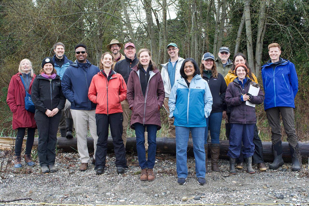 (Jenna Dennison Photo) Attendees present at Congresswoman Jayapal’s tour of Dockton Park, including representatives from Jayapal’s staff, the Vashon Nature Center, Vashon-Maury Island Land Trust, King County and more.