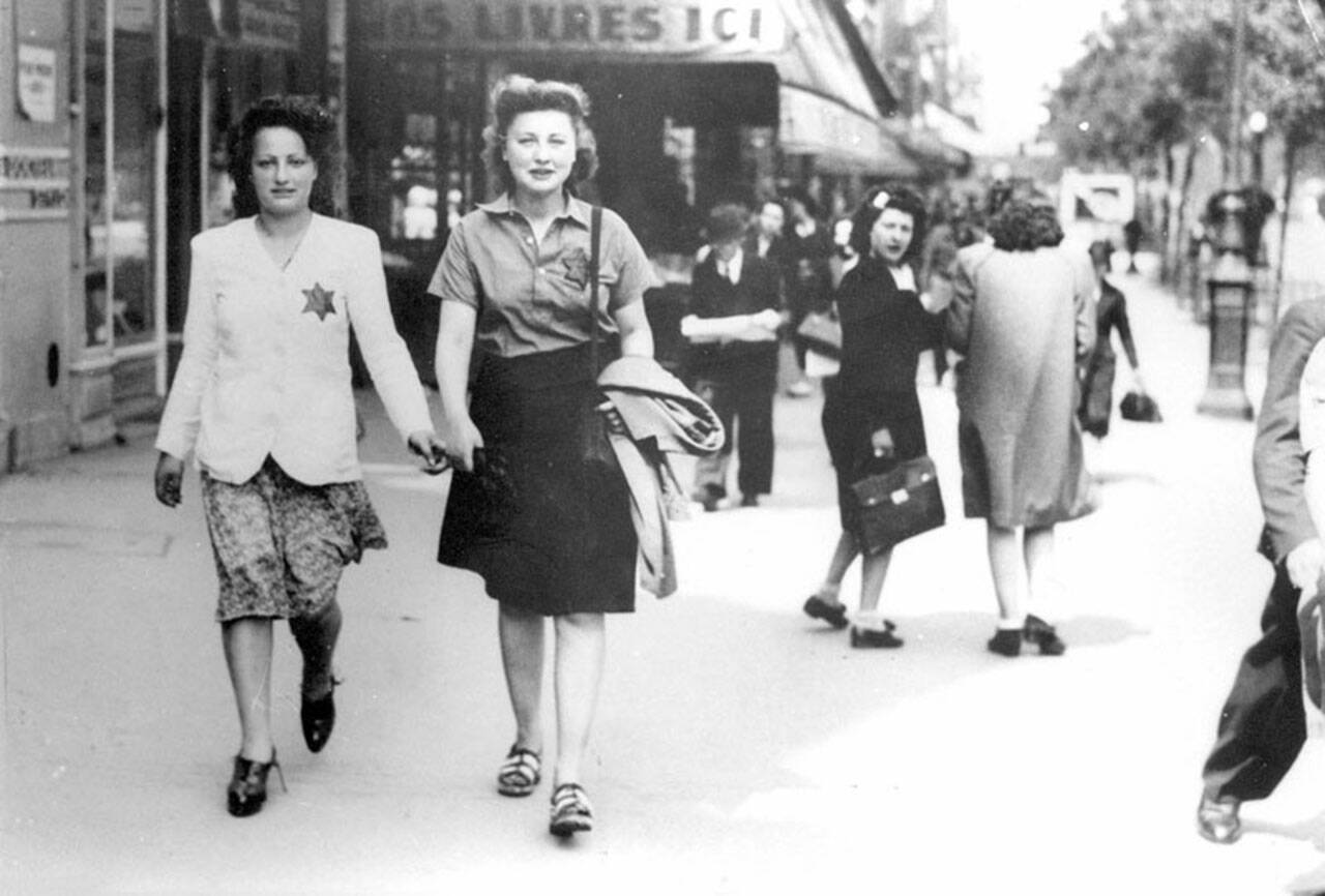 This poster image for “The Ruins of Memory” shows girls in Paris, during its Nazi occupation (Photo Archive, Ghetto Fighters’ House Museum).