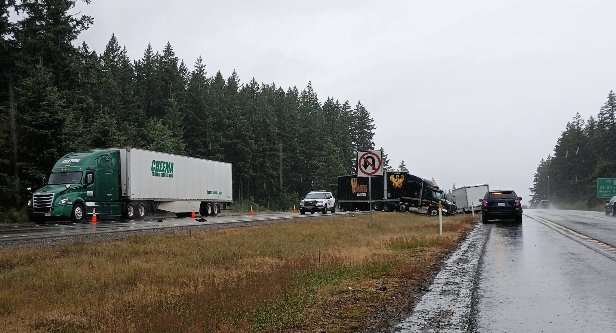 Westbound vehicles were able to move past the damaged semi-truck but traffic was backed up for almost five hours. Photo by Bailey Jo Josie/Sound Publishing.