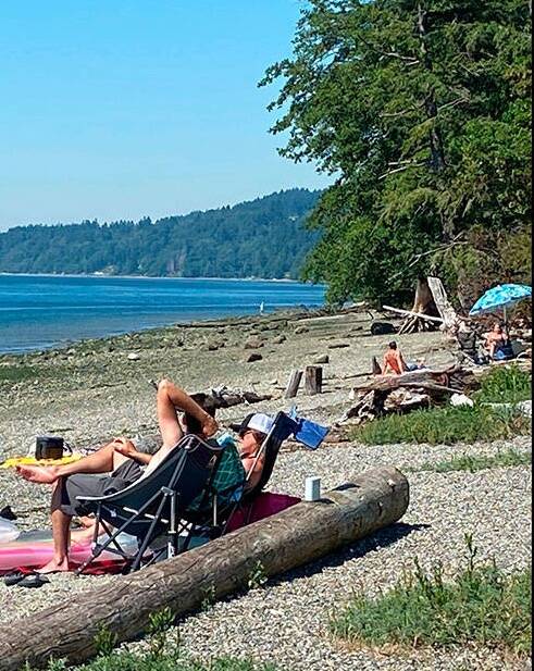 Islanders cooled off at Lisabuela Beach during the extreme heat wave of 2021 (File Photo).