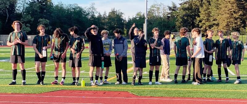 Vashon Pirates boys soccer gets the thumbs up from coach Scott Nicolino after clinching their league entry with a perfect 14-0 record (Shanti Escovedo photo).