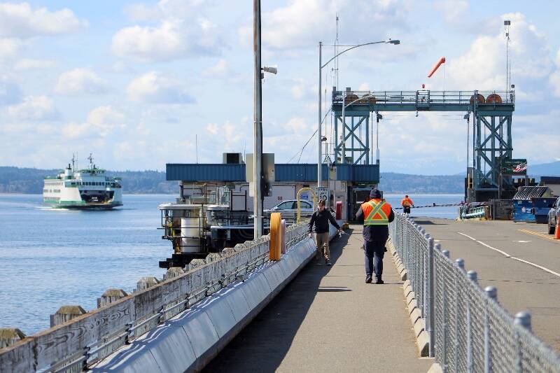 A ferry approaches the Fauntleroy ferry dock in West Seattle to take passengers to Vashon Island and Southworth on the Kitsap Peninsula (Alex Bruell Photo).