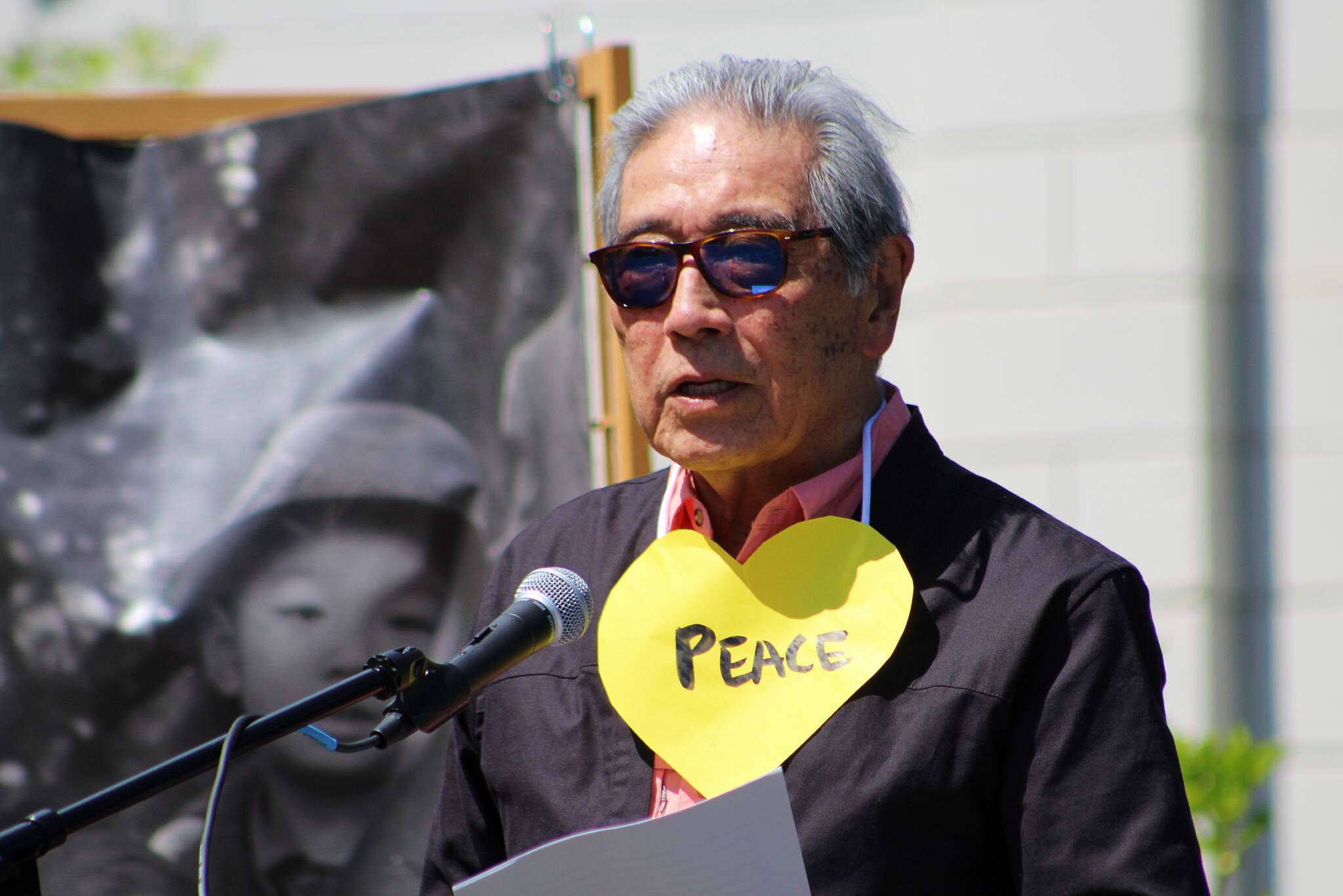 Alex Bruell photo Islander Joe Okimoto, one of the Americans who was unconstitutionally uprooted and forced away from home in 1942, speaks at Ober Park during the Day of Exile commemoration.