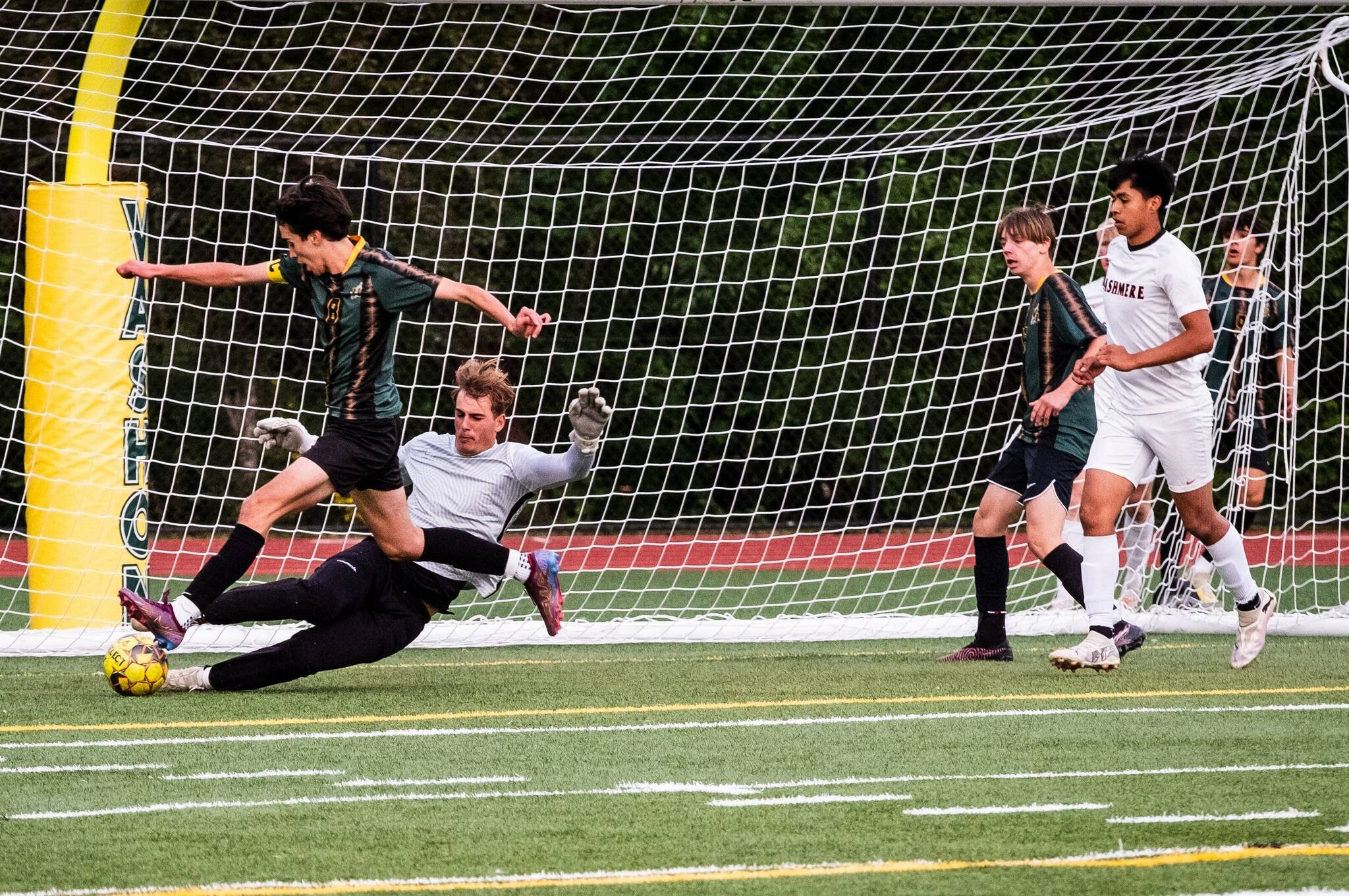 Mason Hanes takes on his opponent, with Isaac Newcomb and Captain Lewis Thompson supporting (Dawn Stief Photo). 
Captain Ellis Cudabeck closes in on adding yet another goal for the Pirates (Dawn Stief Photo).