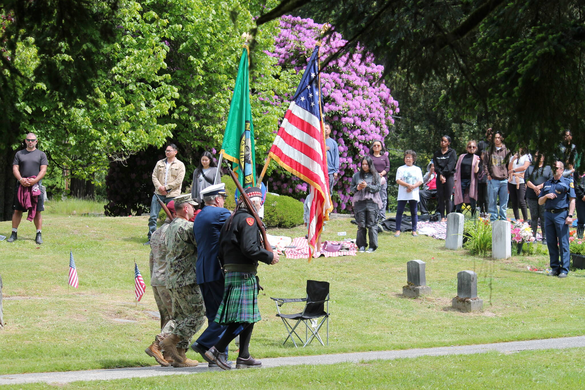 Tom Hughes Photo
The Color Guard, led by Commander John Burke, of the American Legion and Veterans of Foreign War, at Vashon’s Memorial Day service.