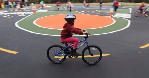 Photo via PublicHealthInsider.com 

Riders of all ages can practice bicycle proficiency and traffic rules at the “Traffic Garden” bicycle playground at Dick Thurnau Memorial Park in White Center, 3.5 miles from the Fauntleroy ferry dock. The park, which has parking, is at 11050 10th Avenue SW, Seattle 98146. It’s open Wednesdays and Thursdays from 10 a.m. to 1 p.m., and on Saturdays from 9 a.m. to noon. The park is closed Sundays, Mondays, Tuesdays and Fridays.