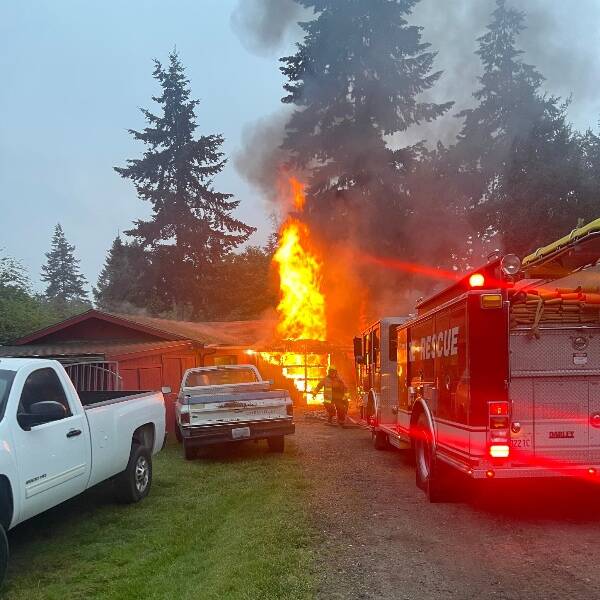 On May 16, firefighters were dispatched to a Maury Island residence where a large, L-shaped garage had caught fire (Vason Island Fire Rescue Photo).