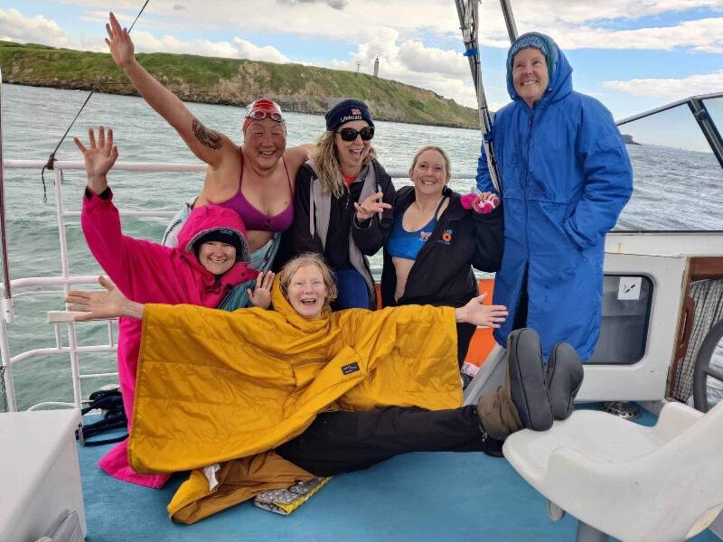 Team Salish Selkies finishes their English Channel swim on June 11. From left to right are: Mary Singer, Chelsea Lee, Mary Robinson, Heidi Skrzypek, MarySue Balazic, and Erin O‘Regan. Singer, Robinson and Skrzypek are from Vashon (Garry Salter photo).