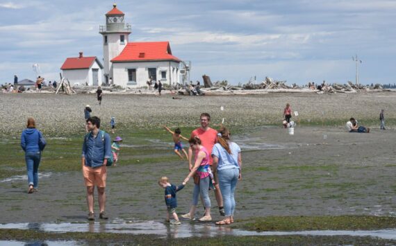 Families visit Point Robinson Park for the Low Tide Festival. (Jim Diers photo.)