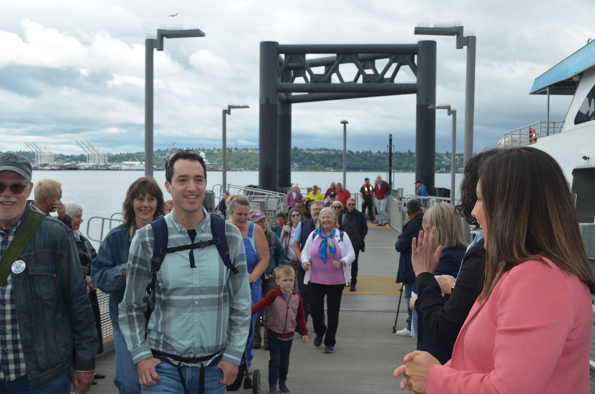 Wendy Aman photo
Passengers step off the King County Water Taxi serving Vashon and Seattle on Thursday, during an inaugural sailing of the taxi’s expanded hours. The passenger-only vessel now runs in the middle of the day, not just mornings and evenings.