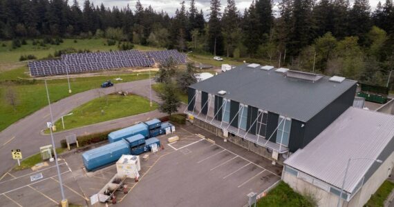 An aerial view of the Vashon Recycling and Transfer Station, with solar array in background. (Photo courtesy King County)