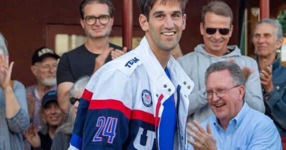 Alex Bruell photo
Olympic athlete Jacob Plihal arrived to the Vashon Theatre backlot to cheers and applause from the Vashon community on Aug. 27.