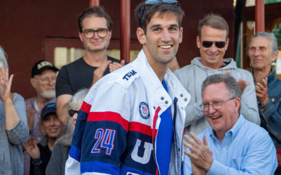 Alex Bruell photo
Olympic athlete Jacob Plihal arrived to the Vashon Theatre backlot to cheers and applause from the Vashon community on Aug. 27.