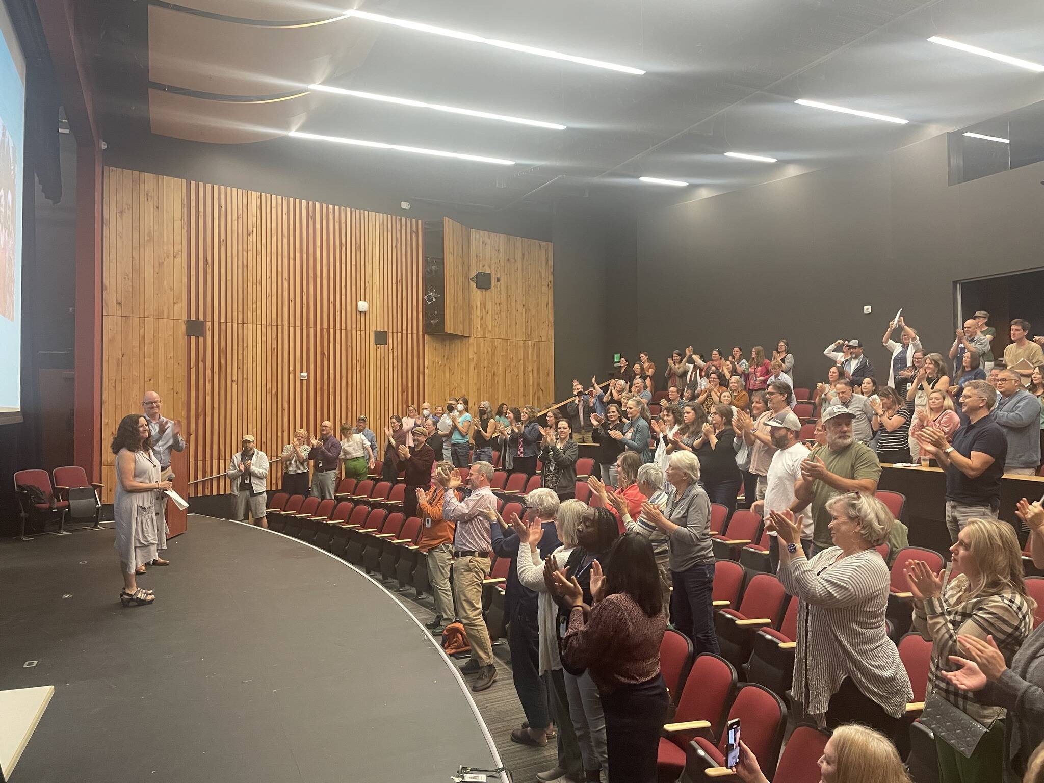 Margie Butcher receives a standing ovation from her peers. (Courtesy photo)