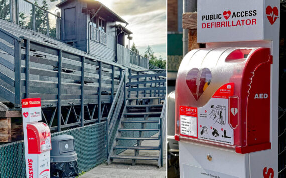 One of the three AEDs has already been installed at the high school football field in time for the start of school. This unit is mounted on the bleachers (left) and also shown in close-up (right). Two other AEDs will be installed where they can be quickly accessed from the soccer and baseball fields plus the McMurray and Chautauqua playfields. The three units are lighted at night and available 24 hours a day. If you use the school fields, it’s a good idea to locate the AEDs in advance, before an emergency, just in case.