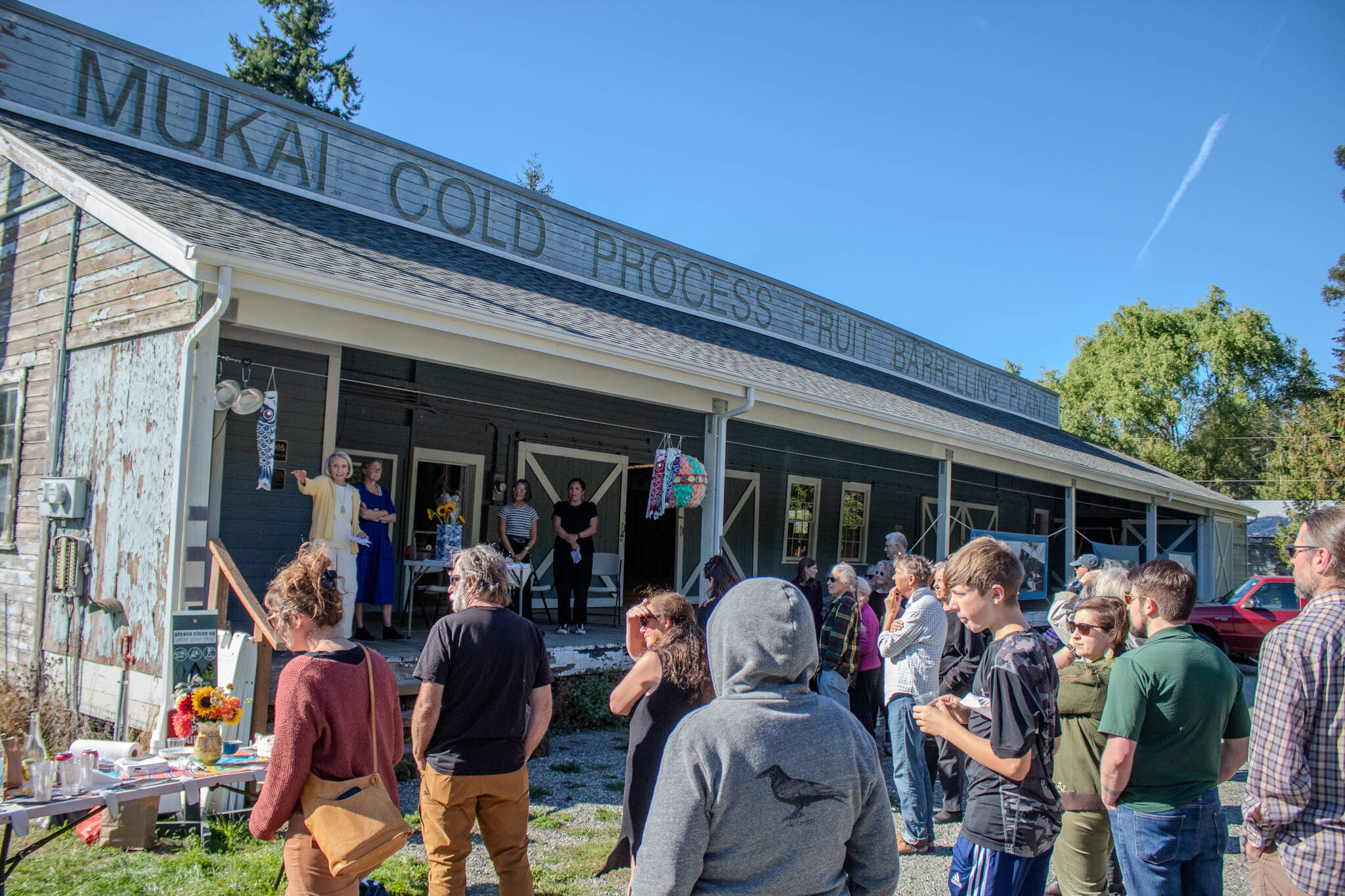 A large crowd gathered Sept. 18 at the Mukai Farm & Garden barreling plant to celebrate the transfer of the property to the Friends of Mukai. (Alex Bruell photo)