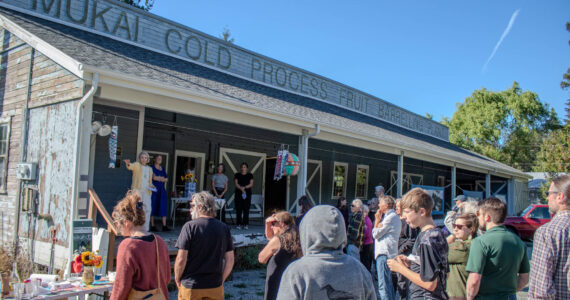 A large crowd gathered Sept. 18 at the Mukai Farm & Garden barreling plant to celebrate the transfer of the property to the Friends of Mukai. (Alex Bruell photo)